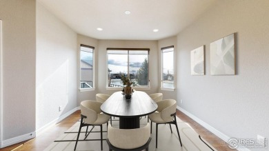 Experience the best of both worlds: watch golfers tee off across on Highland Meadows Golf Course in Colorado - for sale on GolfHomes.com, golf home, golf lot