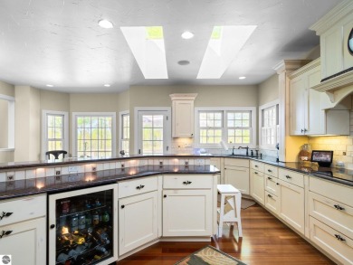 Welcome to this stunning 5-bedroom, 5.5-bath estate on Crystal Mountain Golf Course in Michigan - for sale on GolfHomes.com, golf home, golf lot
