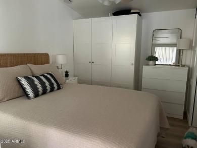 Nestled in a charming RV resort community in Mesa, this 1-bed on Apache Wells Country Club in Arizona - for sale on GolfHomes.com, golf home, golf lot