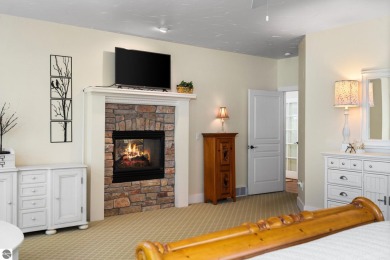 Welcome to this stunning 5-bedroom, 5.5-bath estate on Crystal Mountain Golf Course in Michigan - for sale on GolfHomes.com, golf home, golf lot