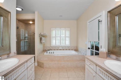 Welcome to this stunning 5-bedroom, 5.5-bath estate on Crystal Mountain Golf Course in Michigan - for sale on GolfHomes.com, golf home, golf lot
