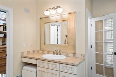 Welcome to this stunning 5-bedroom, 5.5-bath estate on Crystal Mountain Golf Course in Michigan - for sale on GolfHomes.com, golf home, golf lot