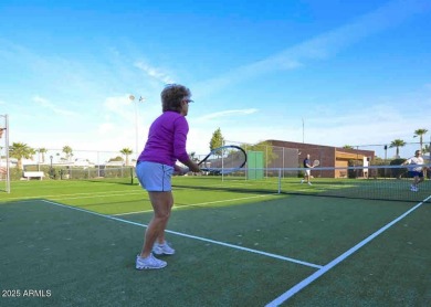 Nestled in a charming RV resort community in Mesa, this 1-bed on Apache Wells Country Club in Arizona - for sale on GolfHomes.com, golf home, golf lot