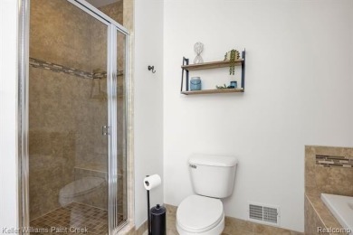 Stunning Ranch Condo in the Heart of Washington Township! on The Glacier Club in Michigan - for sale on GolfHomes.com, golf home, golf lot