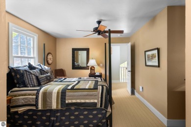 Welcome to this stunning 5-bedroom, 5.5-bath estate on Crystal Mountain Golf Course in Michigan - for sale on GolfHomes.com, golf home, golf lot