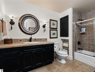 Welcome to this stunning 5-bedroom, 5.5-bath estate on Crystal Mountain Golf Course in Michigan - for sale on GolfHomes.com, golf home, golf lot