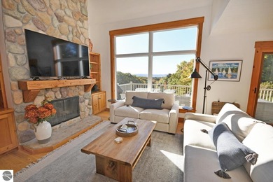 Welcome to this stunning home! Chimney Ridge 8 is situated along on Mountain Flowers Golf Course in Michigan - for sale on GolfHomes.com, golf home, golf lot