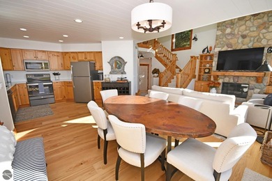 Welcome to this stunning home! Chimney Ridge 8 is situated along on Mountain Flowers Golf Course in Michigan - for sale on GolfHomes.com, golf home, golf lot