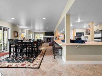 Welcome to this stunning 5-bedroom, 5.5-bath estate on Crystal Mountain Golf Course in Michigan - for sale on GolfHomes.com, golf home, golf lot