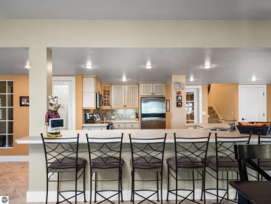 Welcome to this stunning 5-bedroom, 5.5-bath estate on Crystal Mountain Golf Course in Michigan - for sale on GolfHomes.com, golf home, golf lot