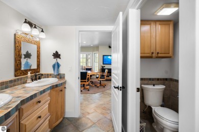 Welcome to this stunning 5-bedroom, 5.5-bath estate on Crystal Mountain Golf Course in Michigan - for sale on GolfHomes.com, golf home, golf lot