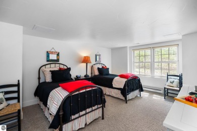 Welcome to this stunning 5-bedroom, 5.5-bath estate on Crystal Mountain Golf Course in Michigan - for sale on GolfHomes.com, golf home, golf lot