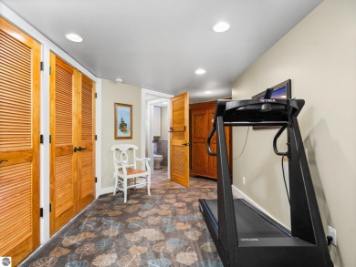 Welcome to this stunning 5-bedroom, 5.5-bath estate on Crystal Mountain Golf Course in Michigan - for sale on GolfHomes.com, golf home, golf lot