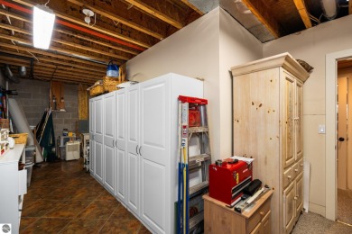 Welcome to this stunning 5-bedroom, 5.5-bath estate on Crystal Mountain Golf Course in Michigan - for sale on GolfHomes.com, golf home, golf lot