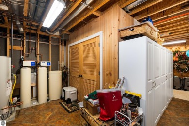 Welcome to this stunning 5-bedroom, 5.5-bath estate on Crystal Mountain Golf Course in Michigan - for sale on GolfHomes.com, golf home, golf lot