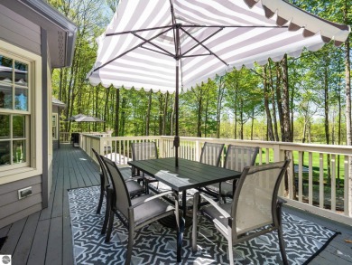 Welcome to this stunning 5-bedroom, 5.5-bath estate on Crystal Mountain Golf Course in Michigan - for sale on GolfHomes.com, golf home, golf lot