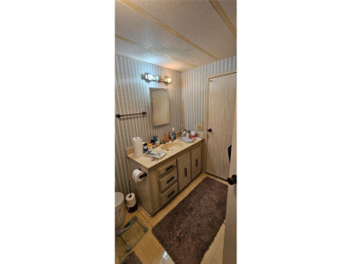Discover peaceful retirement living in the highly sought after on Bonita Fairways in Florida - for sale on GolfHomes.com, golf home, golf lot
