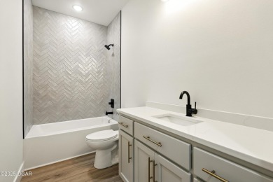 Welcome to 4402 Par Lane--an exceptional new construction by 4 on Twin Hills Golf and Country Club in Missouri - for sale on GolfHomes.com, golf home, golf lot