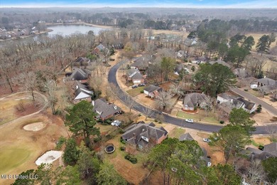 Elevated comfort meets thoughtful design in this completely on Annandale Golf Club in Mississippi - for sale on GolfHomes.com, golf home, golf lot