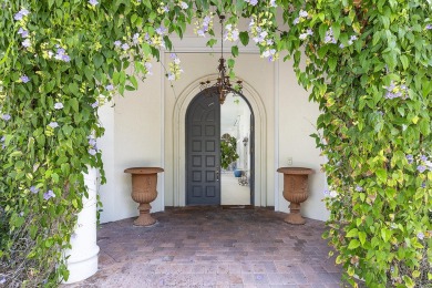 This beautiful courtyard home features four bedrooms on Palm Beach Polo and Country Club in Florida - for sale on GolfHomes.com, golf home, golf lot