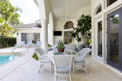 This beautiful courtyard home features four bedrooms on Palm Beach Polo and Country Club in Florida - for sale on GolfHomes.com, golf home, golf lot