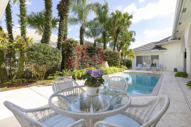 This beautiful courtyard home features four bedrooms on Palm Beach Polo and Country Club in Florida - for sale on GolfHomes.com, golf home, golf lot