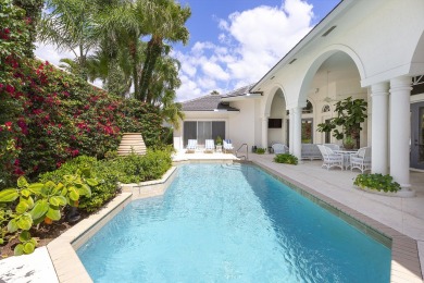 This beautiful courtyard home features four bedrooms on Palm Beach Polo and Country Club in Florida - for sale on GolfHomes.com, golf home, golf lot