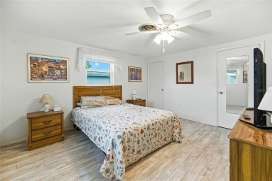 Experience Florida living at its finest in this beautifully on Jacaranda West Country Club in Florida - for sale on GolfHomes.com, golf home, golf lot