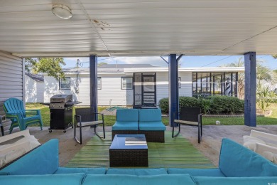 Step into beach living in Cherry Grove! Just a short stroll to on Beachwood Golf Club in South Carolina - for sale on GolfHomes.com, golf home, golf lot