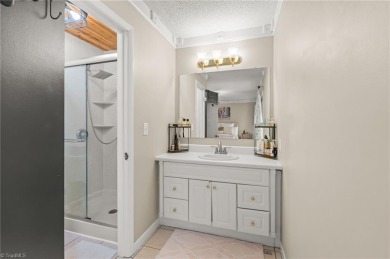 Welcome to this 3-bedroom, 3.5-bath end-unit townhome on Heather Hills Golf Course in North Carolina - for sale on GolfHomes.com, golf home, golf lot