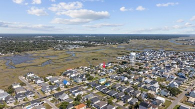 Step into beach living in Cherry Grove! Just a short stroll to on Beachwood Golf Club in South Carolina - for sale on GolfHomes.com, golf home, golf lot