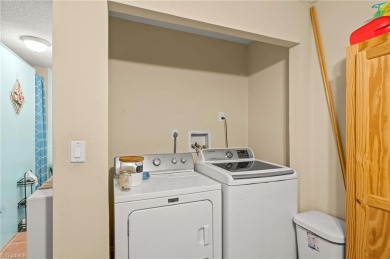 Welcome to this 3-bedroom, 3.5-bath end-unit townhome on Heather Hills Golf Course in North Carolina - for sale on GolfHomes.com, golf home, golf lot