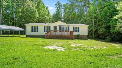 Fully furnished and move-in ready! This beautifully remodeled on Tanglewood Shores Golf Club in Virginia - for sale on GolfHomes.com, golf home, golf lot