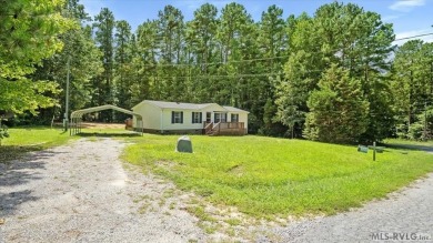 Fully furnished and move-in ready! This beautifully remodeled on Tanglewood Shores Golf Club in Virginia - for sale on GolfHomes.com, golf home, golf lot