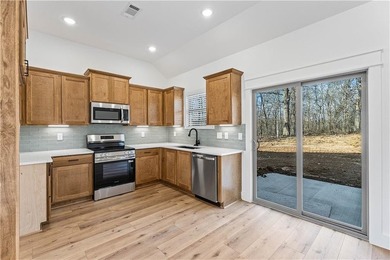 Discover this stunning new construction craftsman style home on Bella Vista Country Club - Highlands in Arkansas - for sale on GolfHomes.com, golf home, golf lot