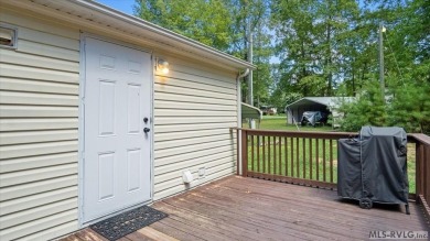 Fully furnished and move-in ready! This beautifully remodeled on Tanglewood Shores Golf Club in Virginia - for sale on GolfHomes.com, golf home, golf lot