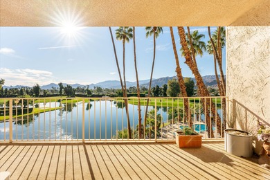 Perched above the shimmering lake and emerald fairways, 899 on Desert Island Golf and Country Club in California - for sale on GolfHomes.com, golf home, golf lot