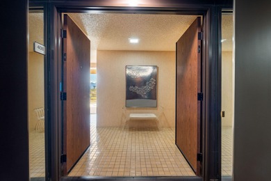 Perched above the shimmering lake and emerald fairways, 899 on Desert Island Golf and Country Club in California - for sale on GolfHomes.com, golf home, golf lot