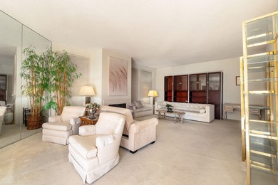 Perched above the shimmering lake and emerald fairways, 899 on Desert Island Golf and Country Club in California - for sale on GolfHomes.com, golf home, golf lot