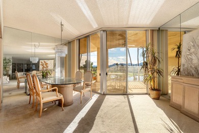 Perched above the shimmering lake and emerald fairways, 899 on Desert Island Golf and Country Club in California - for sale on GolfHomes.com, golf home, golf lot