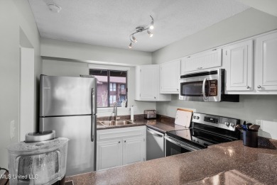 BEAUTIFULLY UPDATED TOP FLOOR GOLF COURSE UNIT WITH 2 BEDROOMS on Diamondhead Country Club in Mississippi - for sale on GolfHomes.com, golf home, golf lot