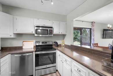 BEAUTIFULLY UPDATED TOP FLOOR GOLF COURSE UNIT WITH 2 BEDROOMS on Diamondhead Country Club in Mississippi - for sale on GolfHomes.com, golf home, golf lot