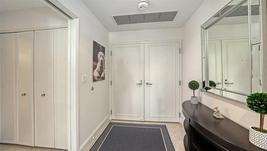 Defined by an exceptional indoor-outdoor connection, this on Longboat Key Golf Club Resort in Florida - for sale on GolfHomes.com, golf home, golf lot