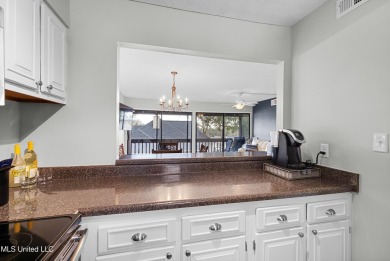 BEAUTIFULLY UPDATED TOP FLOOR GOLF COURSE UNIT WITH 2 BEDROOMS on Diamondhead Country Club in Mississippi - for sale on GolfHomes.com, golf home, golf lot