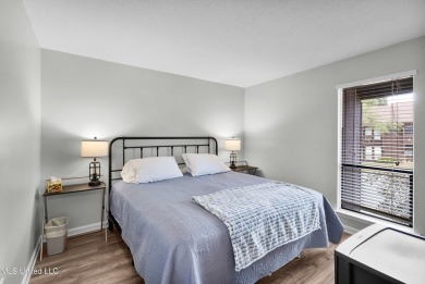 BEAUTIFULLY UPDATED TOP FLOOR GOLF COURSE UNIT WITH 2 BEDROOMS on Diamondhead Country Club in Mississippi - for sale on GolfHomes.com, golf home, golf lot