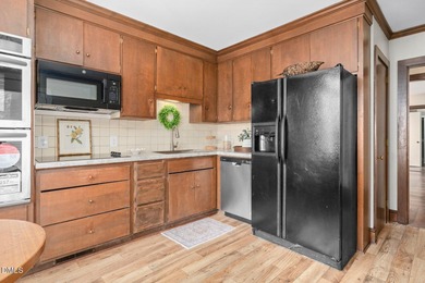 Welcome to this unique and thoughtfully designed home located on on Northgreen Country Club in North Carolina - for sale on GolfHomes.com, golf home, golf lot