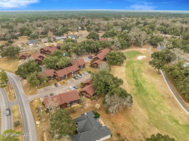 BEAUTIFULLY UPDATED TOP FLOOR GOLF COURSE UNIT WITH 2 BEDROOMS on Diamondhead Country Club in Mississippi - for sale on GolfHomes.com, golf home, golf lot
