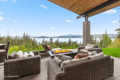 Spectacular custom-built home with beautiful views of Lake Coeur on Gozzer Ranch Golf and Lake Club in Idaho - for sale on GolfHomes.com, golf home, golf lot