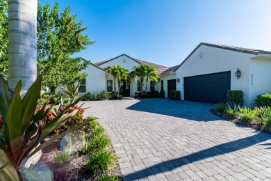 Magnificent four-bedroom, 4.5-bath home plus den, boasts a on The Golf Club At Fiddlers Creek in Florida - for sale on GolfHomes.com, golf home, golf lot