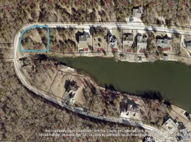 Build your dream home on this waterfront corner lot in the on Raintree Country Club in Missouri - for sale on GolfHomes.com, golf home, golf lot